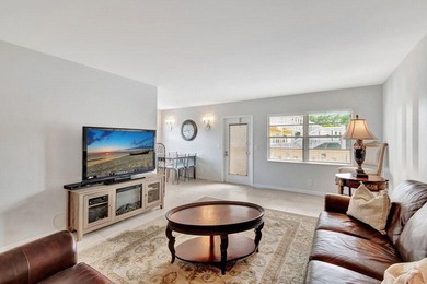 Beautifully appointed Corner unit with Central AC is offered for on Southwinds Golf Course in Florida - for sale on GolfHomes.com, golf home, golf lot