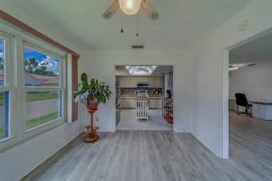 Welcome home to this light and airy 2 bedroom/2 bathroom corner on Mainlands Golf Club in Florida - for sale on GolfHomes.com, golf home, golf lot