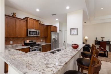 This meticulously maintained two-bedroom plus den, two-bathroom on University Park Country Club in Florida - for sale on GolfHomes.com, golf home, golf lot