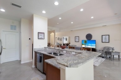 This meticulously maintained two-bedroom plus den, two-bathroom on University Park Country Club in Florida - for sale on GolfHomes.com, golf home, golf lot