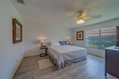 Welcome home to this light and airy 2 bedroom/2 bathroom corner on Mainlands Golf Club in Florida - for sale on GolfHomes.com, golf home, golf lot