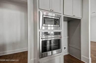 Waterfront - Boathouse - Two Boat Slips - Resort-Style Living on Lake Caroline Golf Club in Mississippi - for sale on GolfHomes.com, golf home, golf lot