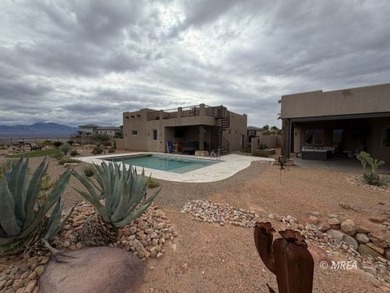 Views, Views, Views!  This beautiful, custom-built home sits on Falcon Ridge Golf Course in Nevada - for sale on GolfHomes.com, golf home, golf lot