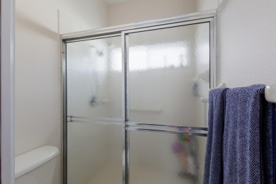 This meticulously maintained two-bedroom plus den, two-bathroom on University Park Country Club in Florida - for sale on GolfHomes.com, golf home, golf lot