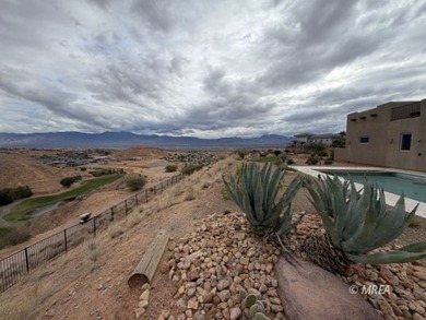 Views, Views, Views!  This beautiful, custom-built home sits on Falcon Ridge Golf Course in Nevada - for sale on GolfHomes.com, golf home, golf lot