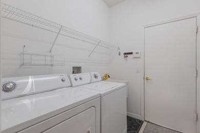 This meticulously maintained two-bedroom plus den, two-bathroom on University Park Country Club in Florida - for sale on GolfHomes.com, golf home, golf lot