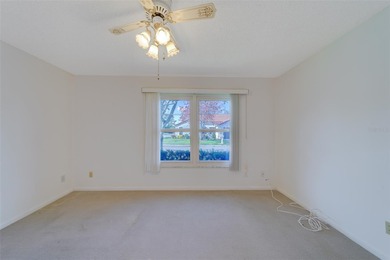 Welcome home to this light and airy 2 bedroom/2 bathroom corner on Mainlands Golf Club in Florida - for sale on GolfHomes.com, golf home, golf lot