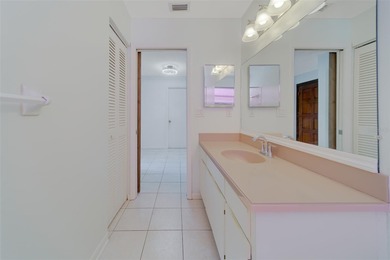 Welcome home to this light and airy 2 bedroom/2 bathroom corner on Mainlands Golf Club in Florida - for sale on GolfHomes.com, golf home, golf lot