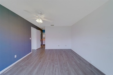 Welcome home to this light and airy 2 bedroom/2 bathroom corner on Mainlands Golf Club in Florida - for sale on GolfHomes.com, golf home, golf lot