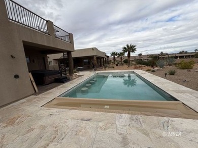 Views, Views, Views!  This beautiful, custom-built home sits on Falcon Ridge Golf Course in Nevada - for sale on GolfHomes.com, golf home, golf lot