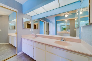 Welcome home to this light and airy 2 bedroom/2 bathroom corner on Mainlands Golf Club in Florida - for sale on GolfHomes.com, golf home, golf lot