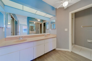 Welcome home to this light and airy 2 bedroom/2 bathroom corner on Mainlands Golf Club in Florida - for sale on GolfHomes.com, golf home, golf lot