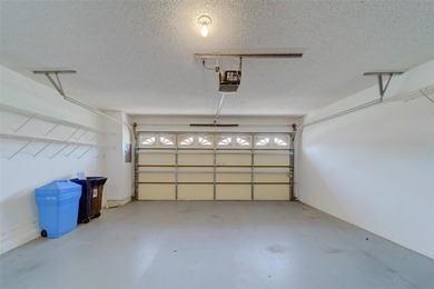 Welcome home to this light and airy 2 bedroom/2 bathroom corner on Mainlands Golf Club in Florida - for sale on GolfHomes.com, golf home, golf lot