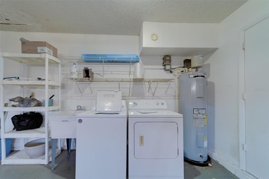 Welcome home to this light and airy 2 bedroom/2 bathroom corner on Mainlands Golf Club in Florida - for sale on GolfHomes.com, golf home, golf lot