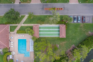 Welcome home to this light and airy 2 bedroom/2 bathroom corner on Mainlands Golf Club in Florida - for sale on GolfHomes.com, golf home, golf lot