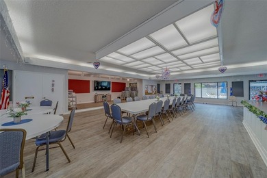 Welcome home to this light and airy 2 bedroom/2 bathroom corner on Mainlands Golf Club in Florida - for sale on GolfHomes.com, golf home, golf lot