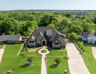 MOTIVATED SELLER! Welcome to your dream retreat in prestigious on Pecan Plantation Country Club in Texas - for sale on GolfHomes.com, golf home, golf lot