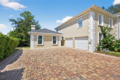 Timeless architecture meets refined modern living in this on Feather Sound Country Club in Florida - for sale on GolfHomes.com, golf home, golf lot
