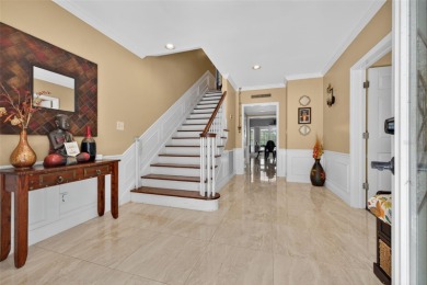 Timeless architecture meets refined modern living in this on Feather Sound Country Club in Florida - for sale on GolfHomes.com, golf home, golf lot