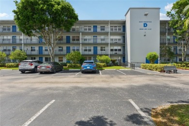 Welcome to this charming 2-bedroom, 1.5-bath condo located in a on Flamingo Lakes Country Club in Florida - for sale on GolfHomes.com, golf home, golf lot