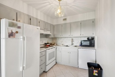 Welcome to this charming 2-bedroom, 1.5-bath condo located in a on Flamingo Lakes Country Club in Florida - for sale on GolfHomes.com, golf home, golf lot