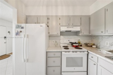 Welcome to this charming 2-bedroom, 1.5-bath condo located in a on Flamingo Lakes Country Club in Florida - for sale on GolfHomes.com, golf home, golf lot