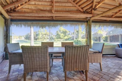 Turnkey RV Lot with Premium Tiki and Lake Views! Enjoy on Motorcoach Resort Golf Course in Florida - for sale on GolfHomes.com, golf home, golf lot