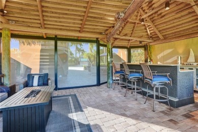 Turnkey RV Lot with Premium Tiki and Lake Views! Enjoy on Motorcoach Resort Golf Course in Florida - for sale on GolfHomes.com, golf home, golf lot