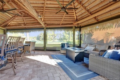 Turnkey RV Lot with Premium Tiki and Lake Views! Enjoy on Motorcoach Resort Golf Course in Florida - for sale on GolfHomes.com, golf home, golf lot