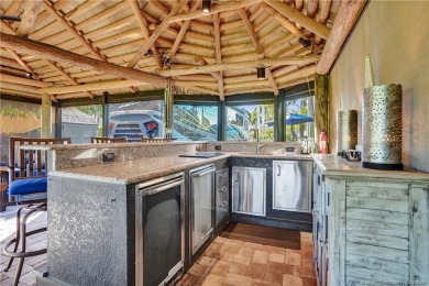 Turnkey RV Lot with Premium Tiki and Lake Views! Enjoy on Motorcoach Resort Golf Course in Florida - for sale on GolfHomes.com, golf home, golf lot