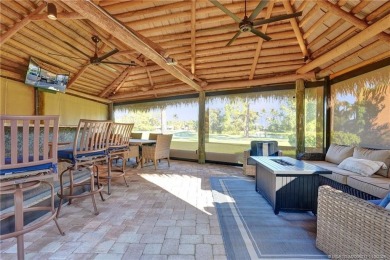 Turnkey RV Lot with Premium Tiki and Lake Views! Enjoy on Motorcoach Resort Golf Course in Florida - for sale on GolfHomes.com, golf home, golf lot