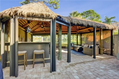 Turnkey RV Lot with Premium Tiki and Lake Views! Enjoy on Motorcoach Resort Golf Course in Florida - for sale on GolfHomes.com, golf home, golf lot