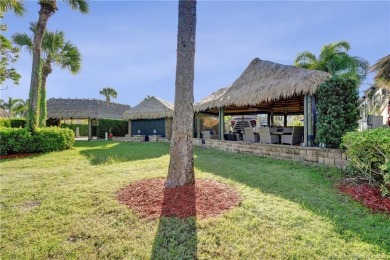 Turnkey RV Lot with Premium Tiki and Lake Views! Enjoy on Motorcoach Resort Golf Course in Florida - for sale on GolfHomes.com, golf home, golf lot