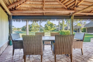 Turnkey RV Lot with Premium Tiki and Lake Views! Enjoy on Motorcoach Resort Golf Course in Florida - for sale on GolfHomes.com, golf home, golf lot