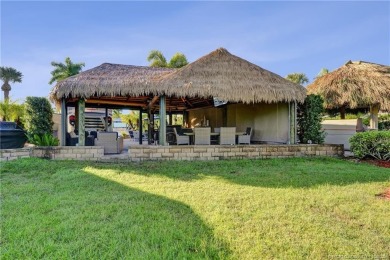 Turnkey RV Lot with Premium Tiki and Lake Views! Enjoy on Motorcoach Resort Golf Course in Florida - for sale on GolfHomes.com, golf home, golf lot