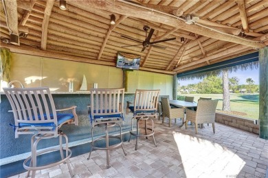 Turnkey RV Lot with Premium Tiki and Lake Views! Enjoy on Motorcoach Resort Golf Course in Florida - for sale on GolfHomes.com, golf home, golf lot