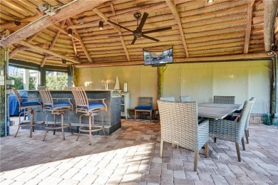 Turnkey RV Lot with Premium Tiki and Lake Views! Enjoy on Motorcoach Resort Golf Course in Florida - for sale on GolfHomes.com, golf home, golf lot