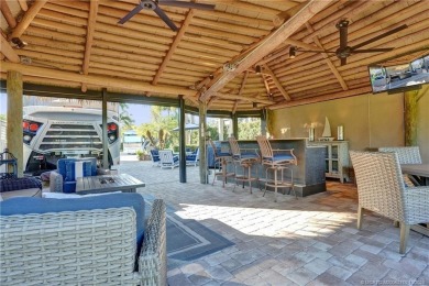 Turnkey RV Lot with Premium Tiki and Lake Views! Enjoy on Motorcoach Resort Golf Course in Florida - for sale on GolfHomes.com, golf home, golf lot