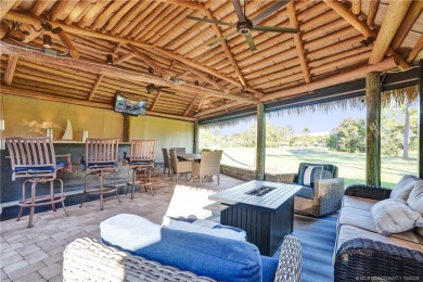 Turnkey RV Lot with Premium Tiki and Lake Views! Enjoy on Motorcoach Resort Golf Course in Florida - for sale on GolfHomes.com, golf home, golf lot