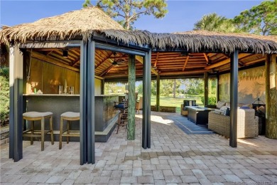 Turnkey RV Lot with Premium Tiki and Lake Views! Enjoy on Motorcoach Resort Golf Course in Florida - for sale on GolfHomes.com, golf home, golf lot