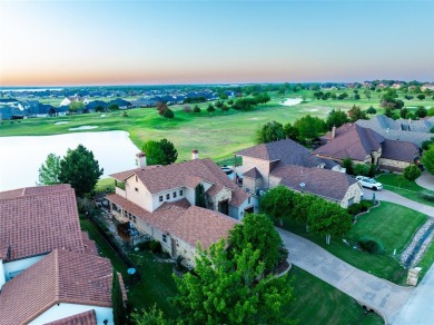 Nestled along the 15th green at The Resort on Eagle Mountain on The Golf Club at Resort Eagle Mountain Lake in Texas - for sale on GolfHomes.com, golf home, golf lot