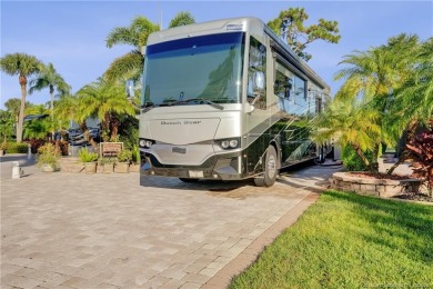 Turnkey RV Lot with Premium Tiki and Lake Views! Enjoy on Motorcoach Resort Golf Course in Florida - for sale on GolfHomes.com, golf home, golf lot