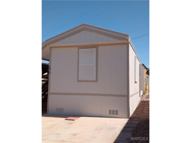 Spacious 1 bedroom 1 bath home. Newly renovated with new paint on Riverview Golf Course in Arizona - for sale on GolfHomes.com, golf home, golf lot