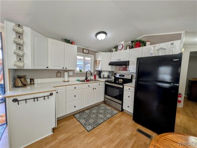 Spacious 1 bedroom 1 bath home. Newly renovated with new paint on Riverview Golf Course in Arizona - for sale on GolfHomes.com, golf home, golf lot