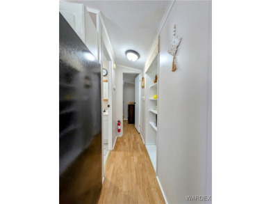 Spacious 1 bedroom 1 bath home. Newly renovated with new paint on Riverview Golf Course in Arizona - for sale on GolfHomes.com, golf home, golf lot