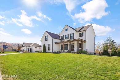 Luxury and leisure come together beautifully at 104 Forest Creek on Oak Ridge Country Club in Tennessee - for sale on GolfHomes.com, golf home, golf lot