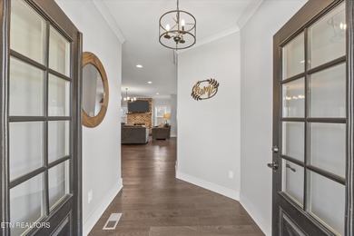 Luxury and leisure come together beautifully at 104 Forest Creek on Oak Ridge Country Club in Tennessee - for sale on GolfHomes.com, golf home, golf lot