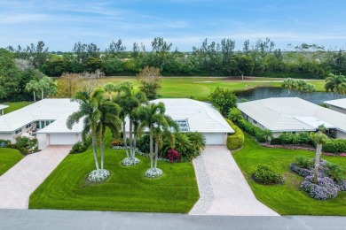 Shimmering lake and golf course views from this luxurious 3 on Quail Ridge Golf Course and Country Club in Florida - for sale on GolfHomes.com, golf home, golf lot