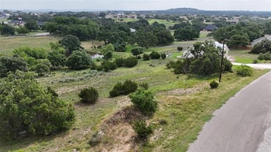 Discover the allure of this exceptional lot nestled in a on Vaaler Creek Golf Club in Texas - for sale on GolfHomes.com, golf home, golf lot