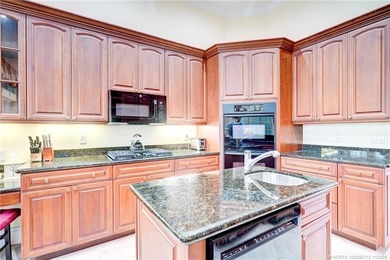 Luxury lakeside living awaits in this 5-bedroom, 3 full and 2 on Willoughby Golf Club in Florida - for sale on GolfHomes.com, golf home, golf lot